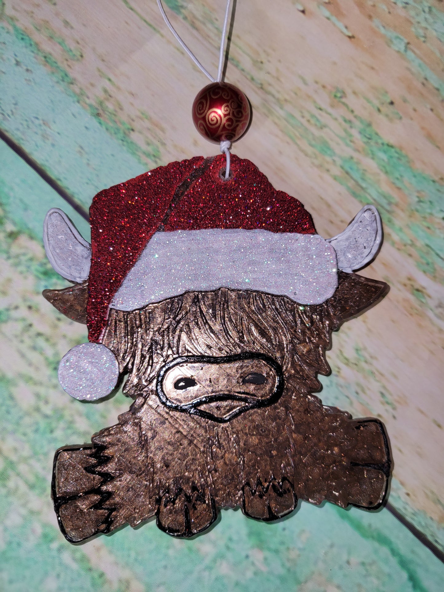 Highland cow Santa hat
