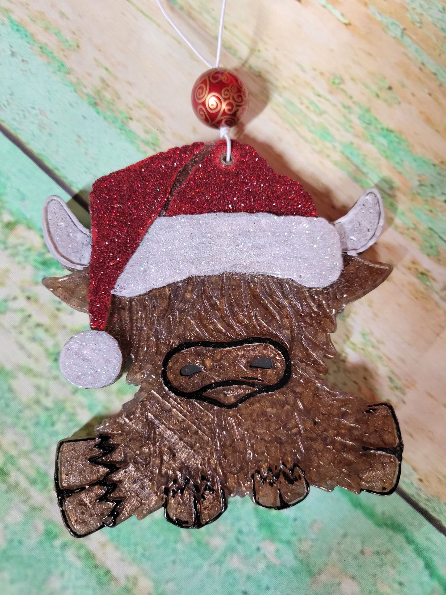 Highland cow Santa hat